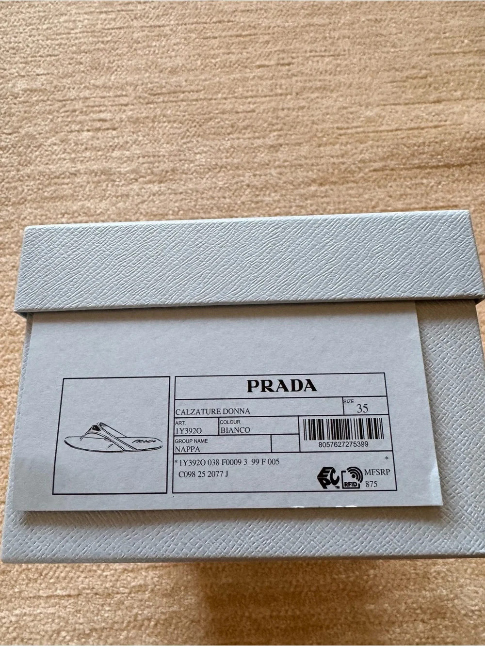 Prada designer white Leather Thong Sandals with Gold Triangle Logo